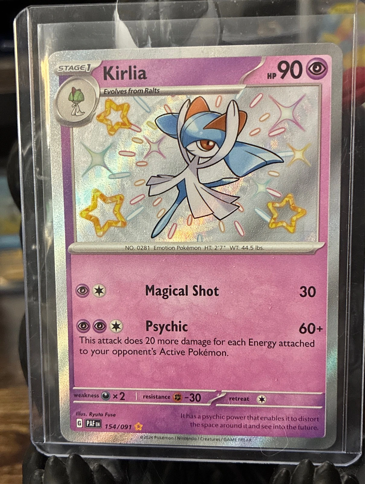 Kirlia - Scarlet & Violet Paldean Fates #154/091
