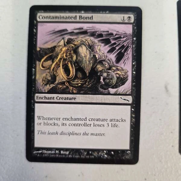 Contaminated Bond - Mirrodin, 10th Edition #014/306