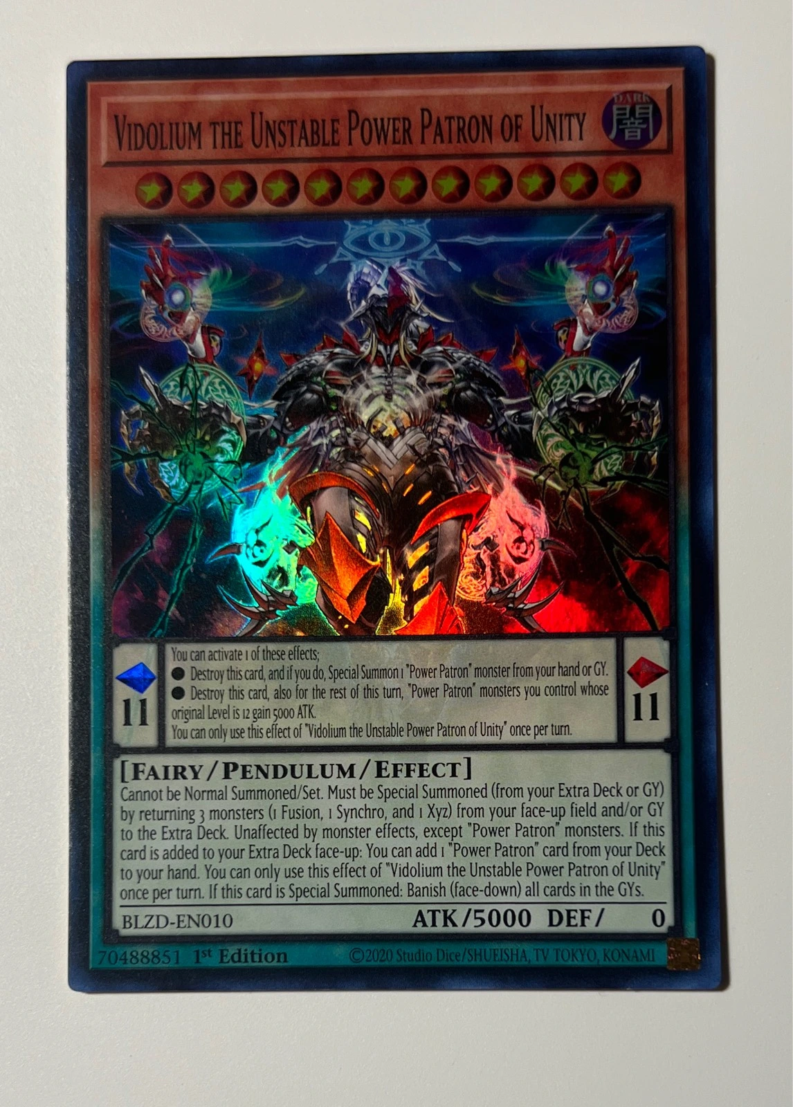 Vidolium the Unstable Power Patron of Unity - Blazing Dawn #BLZD-EN010